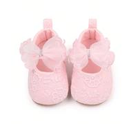 Un paio di scarpe rosa piatte, morbide e confortevoli per neonati e bambine, popolari durante la primavera e l'estate EUR18,EUR19,EUR17Piante