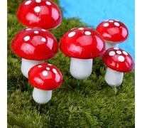 Un tocco di fantasia crea uno spazio con 60 funghi rossi finti nel tuo giardino