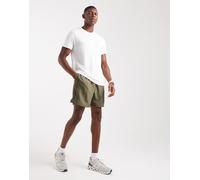 Under Armour - Pantaloncini tecnici verde marino con logo grafico S