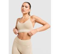 Under Armour Reggiseno Sportivo Vanish Seamless, beige XS
