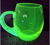Unique uranium glass made a mano decoration - beer glass, volume 0,5 l. The phosphorescent dust in the handle causes its visibility at night, Czech Bohemian Glass. Trasparente