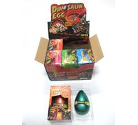 Uovo con dinosauro crescente 12 × 8 cm