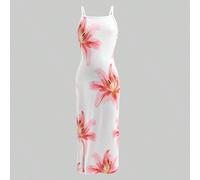 Vestito per ragazze pre-adolescenti con grande stampa digitale di giglio rosa-viola su sfondo bianco, motivo floreale vivido e accattivante, vibrazioni tropicali. Silhouette aderente che valorizza la 