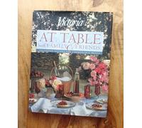 Victoria at Table With Family and Friends