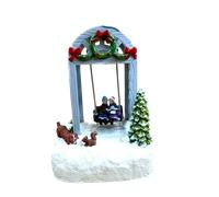 Villaggio Natalizio Altalena con Bimbi Cm11x14x19h + Luci e Movimento Giostrina