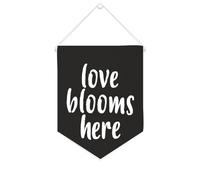 Yelolyio Bandiera da parete in tela con citazione ispiratrice con scritta "Love Blooms Here", decorazione per casa e ufficio, 25,4 x 30,5 cm, idea regalo per l'inaugurazione della casa