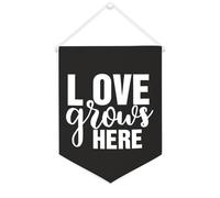 Yelolyio Bandiera da parete in tela con citazione ispiratrice con scritta "Love Grows Here", decorazione per casa e ufficio, 30,5 x 40,6 cm, idea regalo per l'inaugurazione della casa