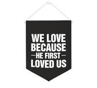 Yelolyio Striscione in tela con scritta in lingua inglese "We Love Because He First Loved Us", da appendere alla parete, decorazione per la casa, per soggiorno, camera da letto, ufficio, vacanze, 30,5