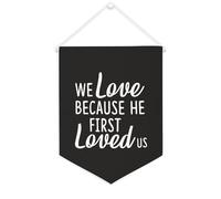 Yelolyio Striscione in tela con scritta in lingua inglese "We Love Because He First Loved Us", da appendere alla parete, decorazione per la casa, per soggiorno, camera da letto, ufficio, vacanze, 30,5