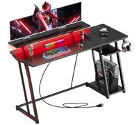 YeTom Scrivania da gioco da 119,4 cm con luci a LED e prese di corrente, tavolo da gioco in fibra di carbonio con supporto per monitor e ripiani regolabili | Scrivania ergonomica RGB per gamer, eSport