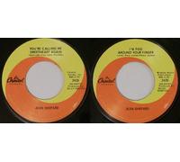 you're calling me sweetheart again / i'm tied around your finger 45 rpm single